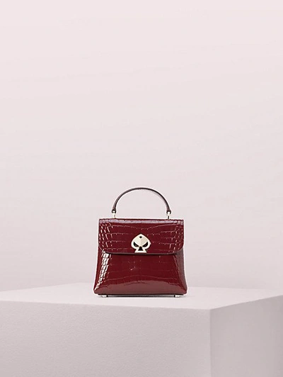 Shop Kate Spade Romy Croc-embossed Mini Flap Top Handle Bag In Cherrywood