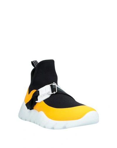 Shop Fendi Sneakers In Yellow