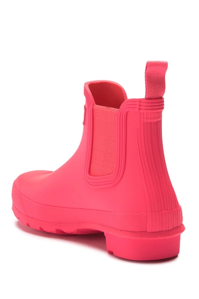 Shop Hunter Original Waterproof Chelsea Rain Boot In Hyper Pink