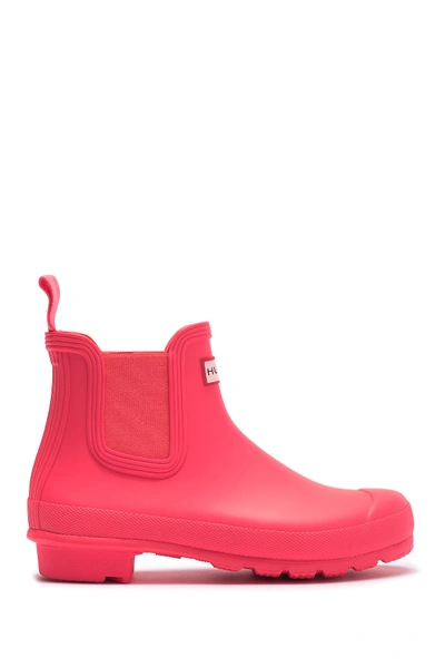 Shop Hunter Original Waterproof Chelsea Rain Boot In Hyper Pink