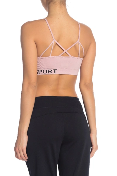 Shop Dkny Low Impact Strappy Sports Bra In Mulberry