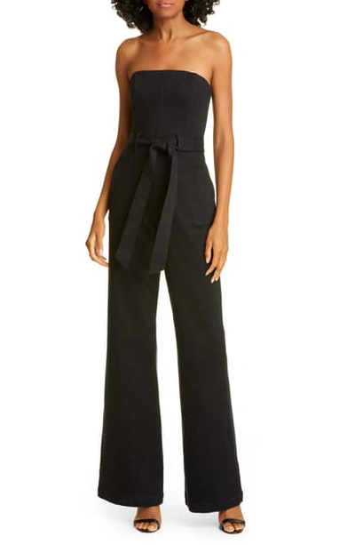 Shop Alice And Olivia Gorgeous Susy Strapless Denim Jumpsuit In Queen Of The Night