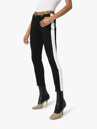 Shop Burberry Girvan Deer Print Trim Jeans In Black