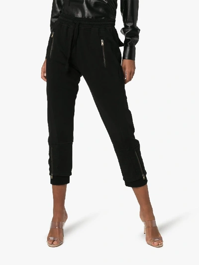Shop Haider Ackermann Layered Cuff Cropped Track Trousers In Black
