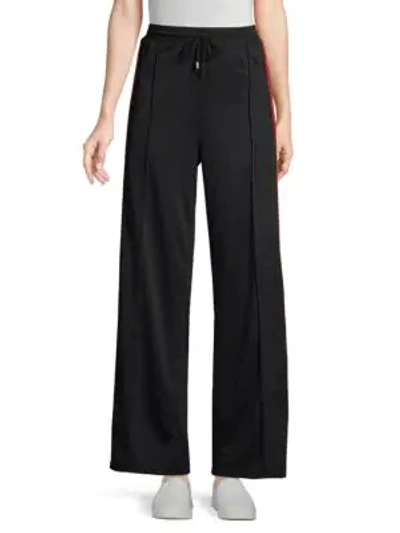 Shop Rebecca Minkoff Betsy Sport Striped Pants In Black Multi
