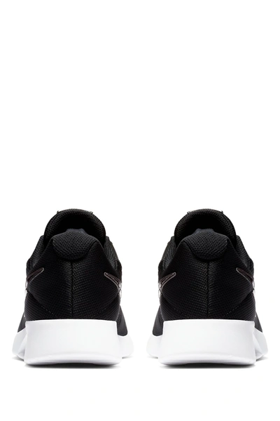 Shop Nike Tanjun Sneaker In 009 Black