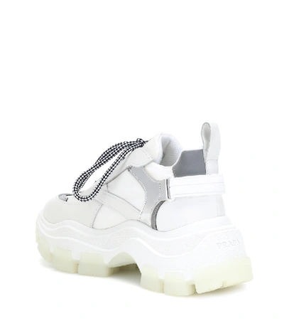 Shop Prada Pegasus Leather Sneakers In White