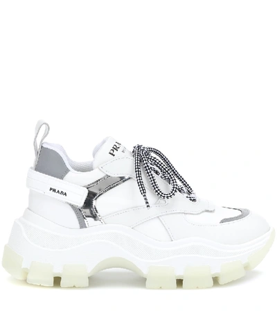 Shop Prada Pegasus Leather Sneakers In White