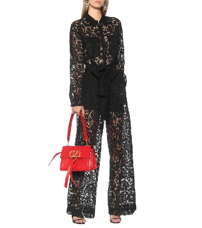 Shop Valentino Lace Jumpsuit In Black