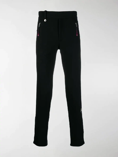 Shop Alexander Mcqueen Logo Embroidered Track Pants In Black