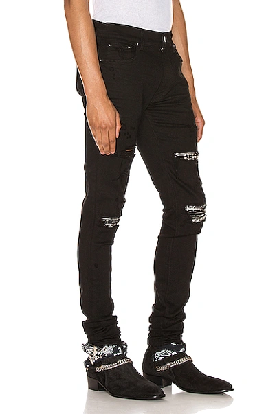 Shop Amiri Music Note Patch Jean In Blue In Black