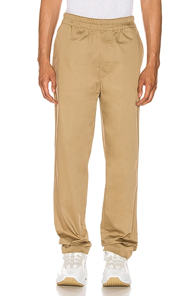Shop Acne Studios Paco Satin Trousers In Sand Beige