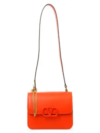 Shop Valentino Garavani Vsling Leather Crossbody Bag In Orange