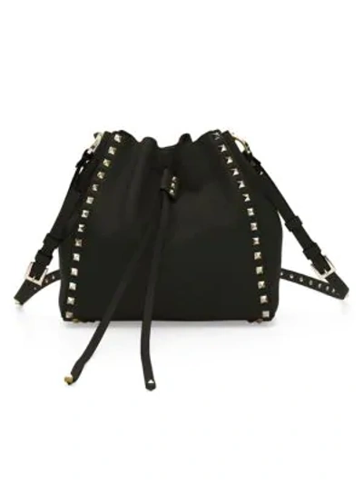 Shop Valentino Garavani Small Rockstud Leather Bucket Bag In Black