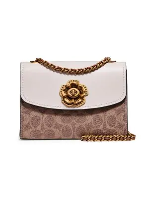 coach parker 18 in signature canvas with rivets