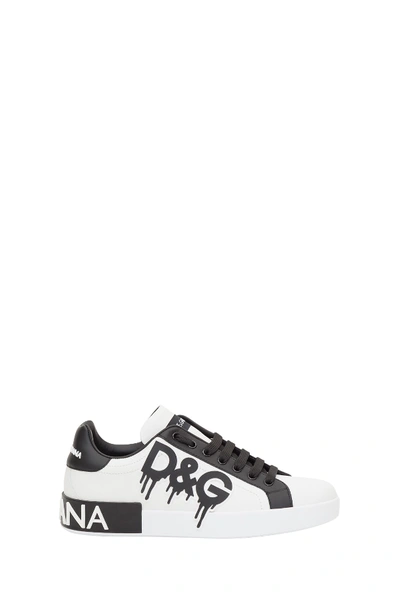 Shop Dolce & Gabbana Portofino Sneakers With Dripping Logo In Bianco/nero