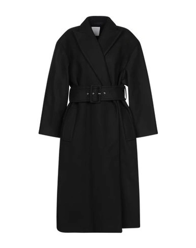 Shop Sandro Coat In Black