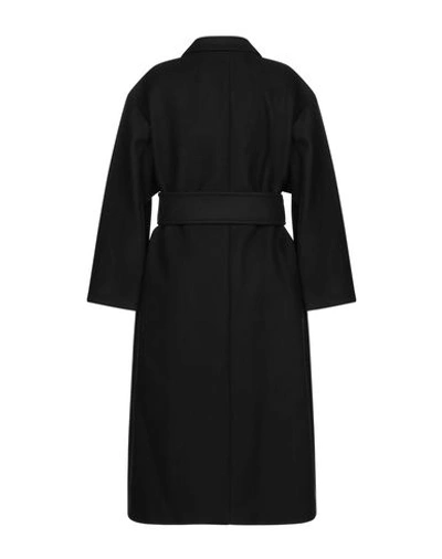 Shop Sandro Coat In Black