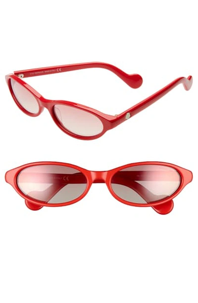 Shop Moncler 58mm Oval Sunglasses In Shiny Red/ Bordeaux Mirror