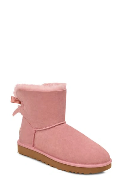 Shop Ugg Mini Bailey Bow Ii Genuine Shearling Bootie In Pink Crystal Suede