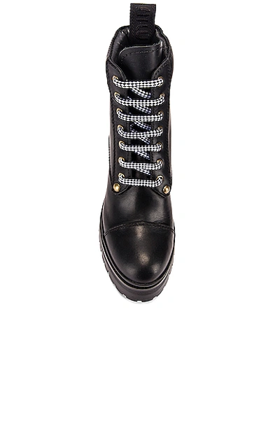 Shop Miu Miu Lace Up Leather Ankle Boots In Black