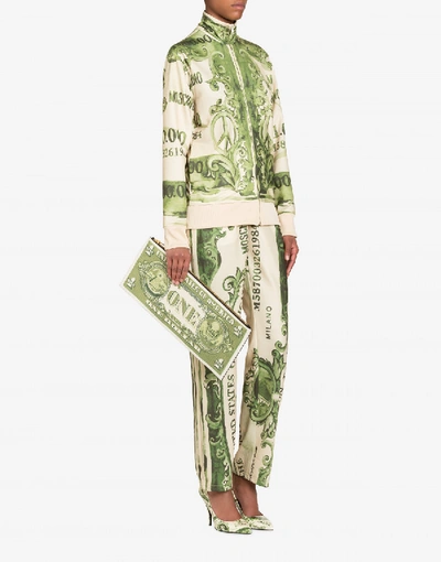 Shop Moschino Dollar Maxi Clutch In Green