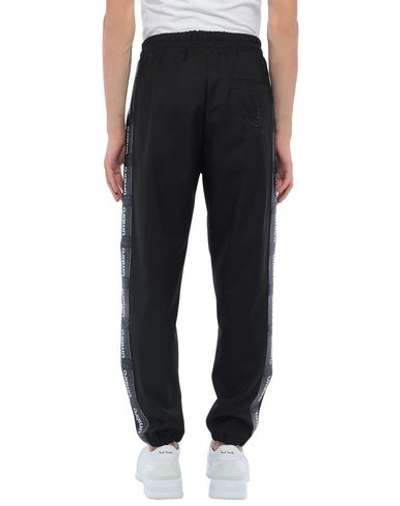 Shop Umbro Casual Pants In Black