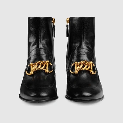 Shop Gucci Women's Leather Horsebit Chain Boot In Black