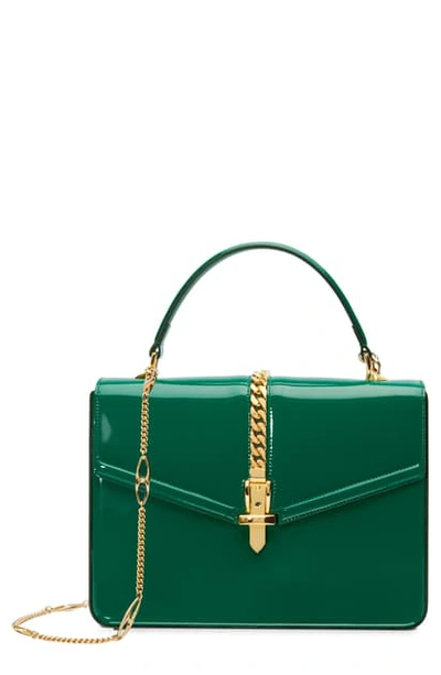 Shop Gucci Small Sylvie 1969 Patent Leather Top Handle Bag - Green In Emerald