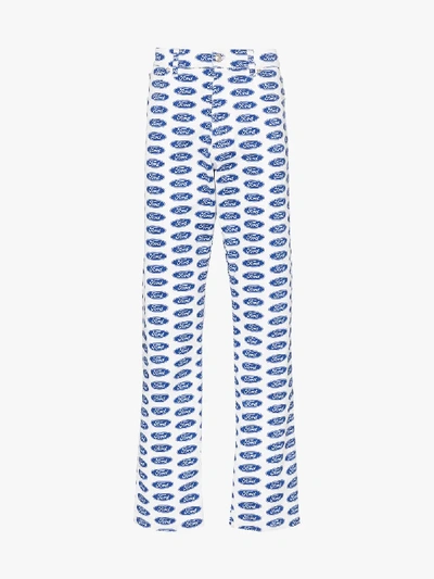 Shop Versace X Ford Logo Print Straight Leg Jeans In Blue