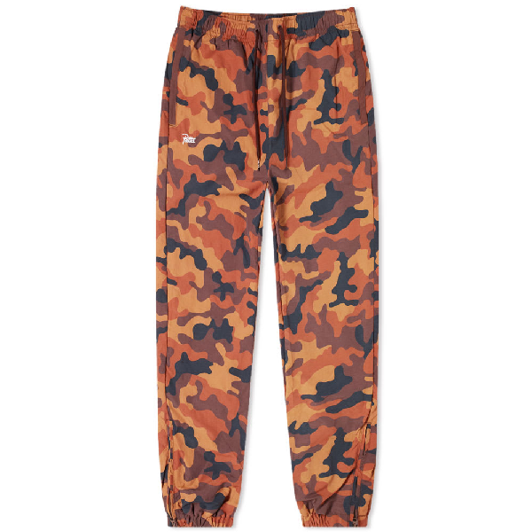 orange camo track pants