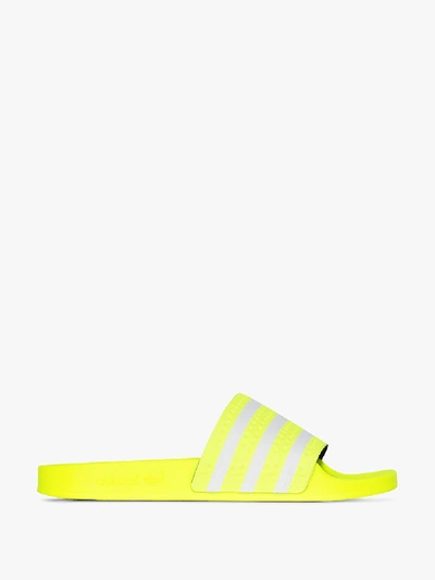 Shop Adidas Originals Adidas Yellow Adilette Striped Slides