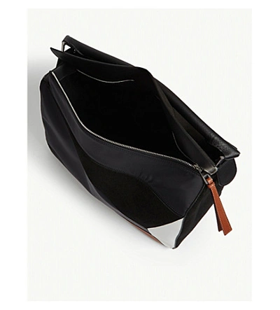 Shop Loewe Puzzle Leather Trainer Bag In Black Tan