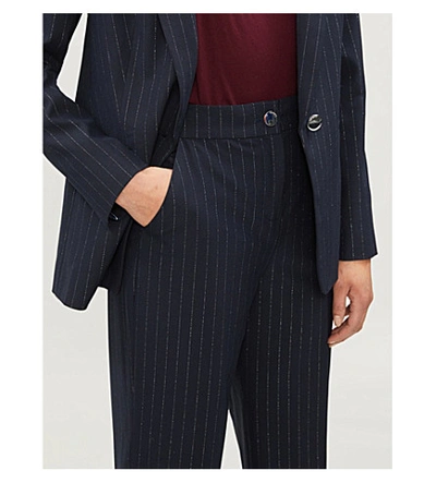 Shop Ted Baker Eevettt High-rise Flared Pinstripe Crepe Trousers In Navy