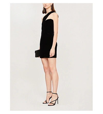 Shop Saint Laurent Asymmetric Cut-out Velvet Mini Dress In Noir