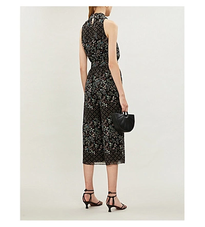 Shop Ted Baker Hazel High-neck Floral-print Crepe Jumpsuit In Black