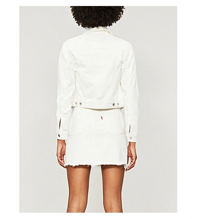 Shop Levi's Deconstructed Frayed-hem Denim Mini Skirt In Pearly White