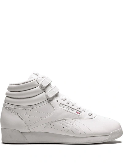 Shop Reebok Freestyle Hi Sneakers - White