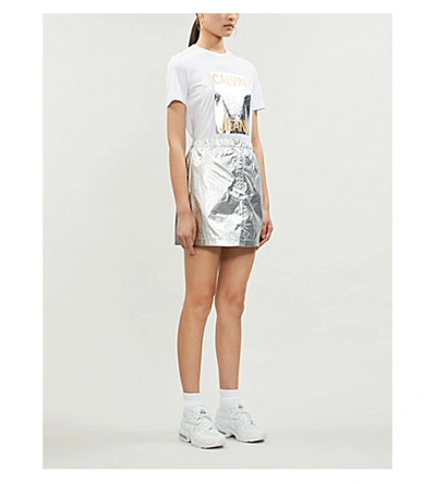 Shop Calvin Klein Metallic Logo-patch Shell Mini Skirt In Silver Place Holder