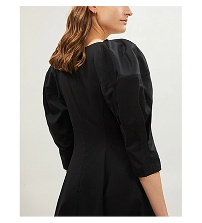 Shop Khaite Dina Puffed-sleeve Cotton-poplin Midi Dress In Black