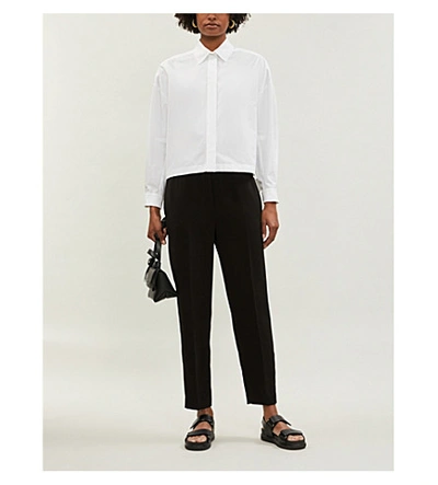 Shop Theory High-rise Relaxed-fit Jersey Trousers In Black