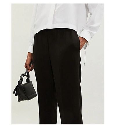 Shop Theory High-rise Relaxed-fit Jersey Trousers In Black