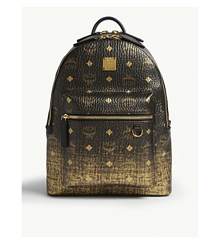 black and gold mcm bag