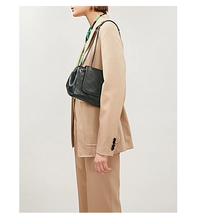Shop Saint Laurent Nolita Monogram Small Leather Shoulder Bag In Deep Green