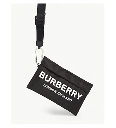 Shop Burberry Nylon Pouch Bag In Black