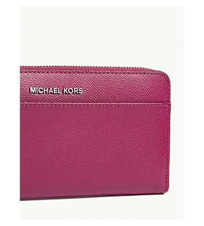 Shop Michael Michael Kors Mercer Continental Leather Wallet In Garnet