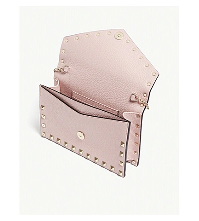 Shop Valentino Rockstud Leather Extra-small Cross-body Bag In Water Rose