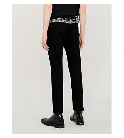 Shop Versace Scarf-print Slim-fit Jeans In Nero
