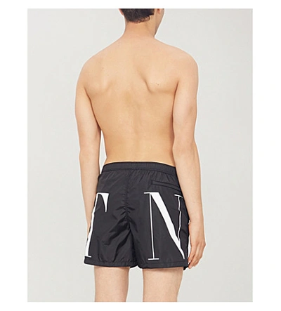 Shop Valentino Relaxed-fit Logo-print Swim Shorts In Black