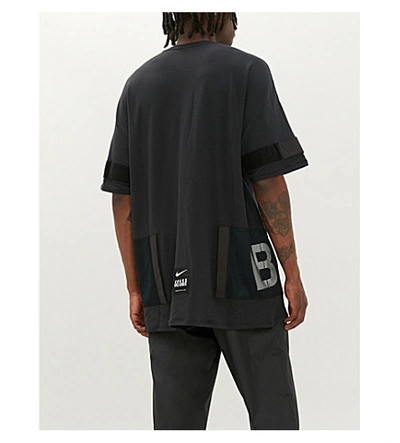 Shop Nike X Undercover Oversized Logo-print Stretch-jersey T-shirt In Black/black